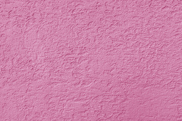 Texture of pink rough plaster. Abstract design background.