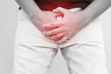 man covers groin, health problems disease for premature ejaculation, fertility, erection. The...