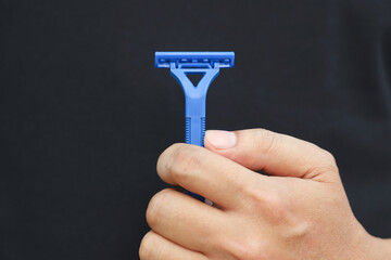 Close up razor for shaving men's pubic hair