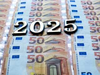 Background of the fifty euros banknotes and 2025