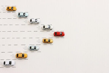 Concept image of challenge and teamwork. Red car leading the group.
