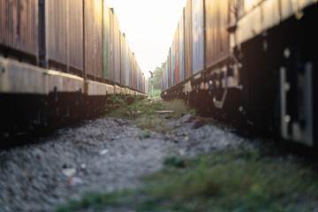 Many containers are on trains that move on rails according to the rail transportation concept and drive the transportation industry.