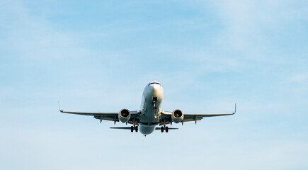 Airplane on the runway before takeoff at sunrise or sunset
