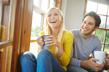 Happy couple, laughing and window with coffee in relax for fun morning, holiday or weekend at home....