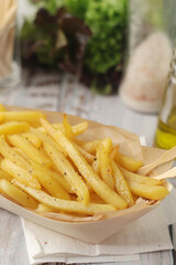 A plate with french fries potatoes
