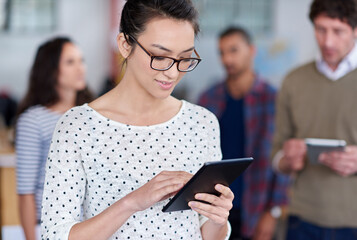 Creative, woman and online with tablet in office for web design or development for startup agency,...