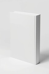 White hardcover book standing on seamless white surface. Minimalistic design mockup.
