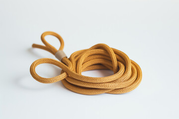 A close up of a yellow rope isolated on white background. Copy Space.  Generative AI