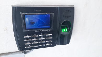 black fingerprint attendance tool used in offices