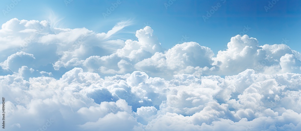 Poster background with a pattern of white clouds against a sky creating a picturesque copy space image