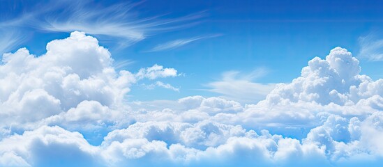 Cloud texture against a blue sky with ample copy space image