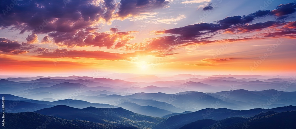 Poster view of a stunning and colorful sunset in the mountains with a captivating copy space image