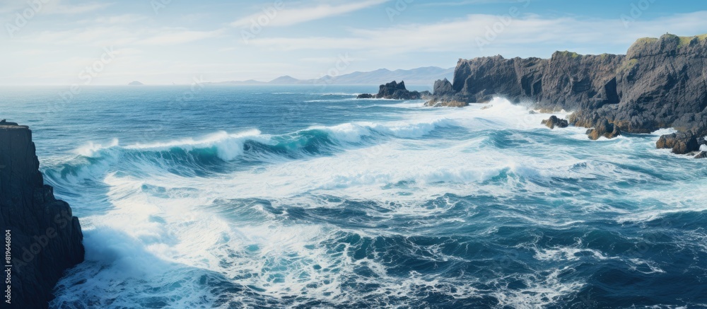 Poster ocean waves breaking against the jagged basalt coast with an expansive copy space image available