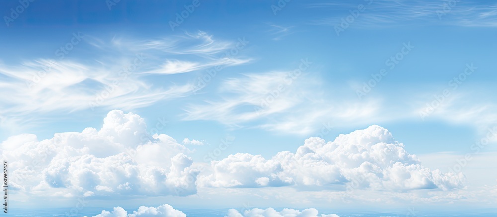 Poster scenic view of a cloud filled clear sky with a beautiful backdrop for a copy space image