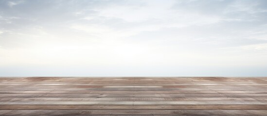 Wooden deck against a plain white backdrop with plenty of copy space image available