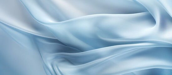 Obraz premium Use this delicate blue silk organza with an open weave as a luxurious material for your special occasions or projects perfect for a textured background with copy space image