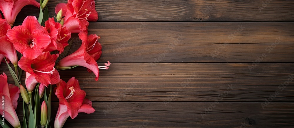 Poster gladiolus displayed on a rustic wooden surface with copy space image