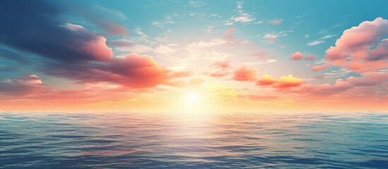 Fototapeta premium Admiring the sunset over the ocean with a beautiful view of the sea and the fading sun in the background ideal for a serene copy space image