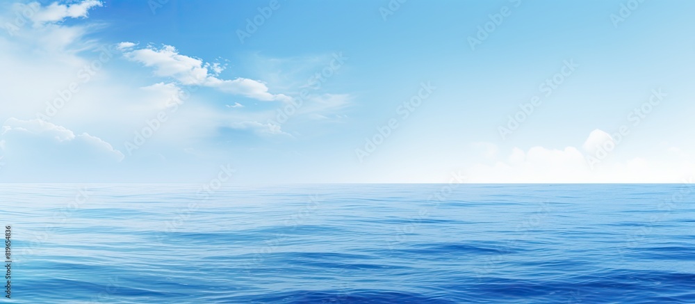 Poster the serene blue sea and sky stretch endlessly creating a calming scene with a vast copy space image