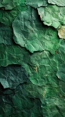 The surface of green cardboard. Mobile phone wallpaper with vignetting. Olive vertical background. Rough natural paper texture with cellulose fibers. Coloured paperboard of a calm and soft tint. Macro