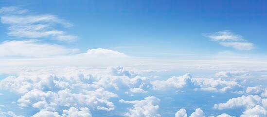 White cloud floating in the vast expanse of the clear blue sky creating a serene and peaceful atmosphere in the scene with copy space image