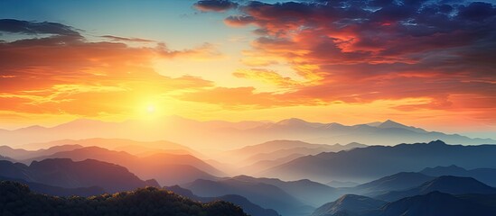 View of a stunning and colorful sunset in the mountains with a captivating copy space image