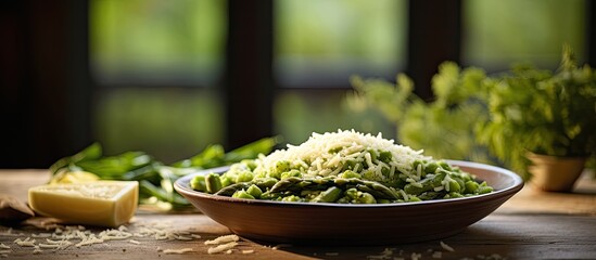 Rice with wild asparagus served in a plate on a wooden table alongside asparagus and parmesan. Copy space image. Place for adding text and design - Powered by Adobe