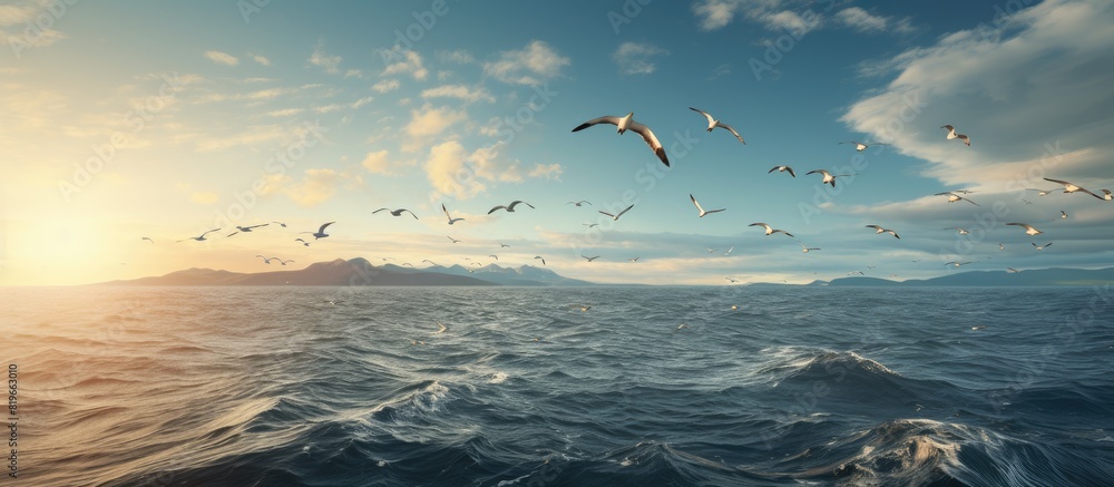 Poster seagulls are gracefully gliding on the surface of the irish sea with a serene backdrop. copy space i