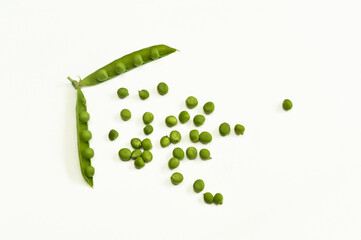 peas are green on a white background. concept