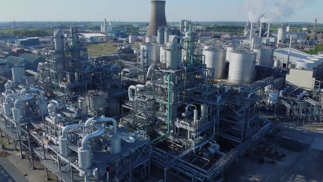 Drone 50fps. Oil refinery. Cooling towers. Oil distillation units. Oil industry, manufacturing.
