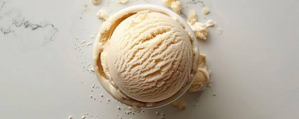 Fototapeta premium Closeup top view of an ice cream ball, creamy texture and rich color, on a clean white surface, perfect for food photography