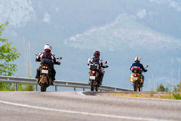 Tourists in Antalya, Turkey, riding motorbikes in the mountains