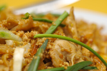 Fried rice with meat and vegetables on a plate, Thai cuisine