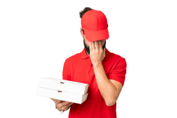 Pizza delivery man with work uniform picking up pizza boxes over isolated chroma key background with tired and sick expression