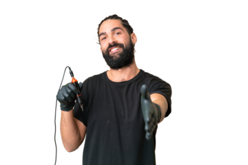 Tattoo artist caucasian man over isolated chroma key background shaking hands for closing a good deal