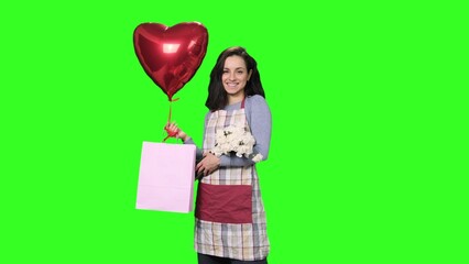 Female florist with red air balloon, white carnations and bag on the chroma key