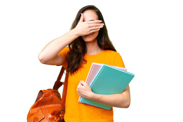 Young student caucasian woman over isolated background covering eyes by hands. Do not want to see...