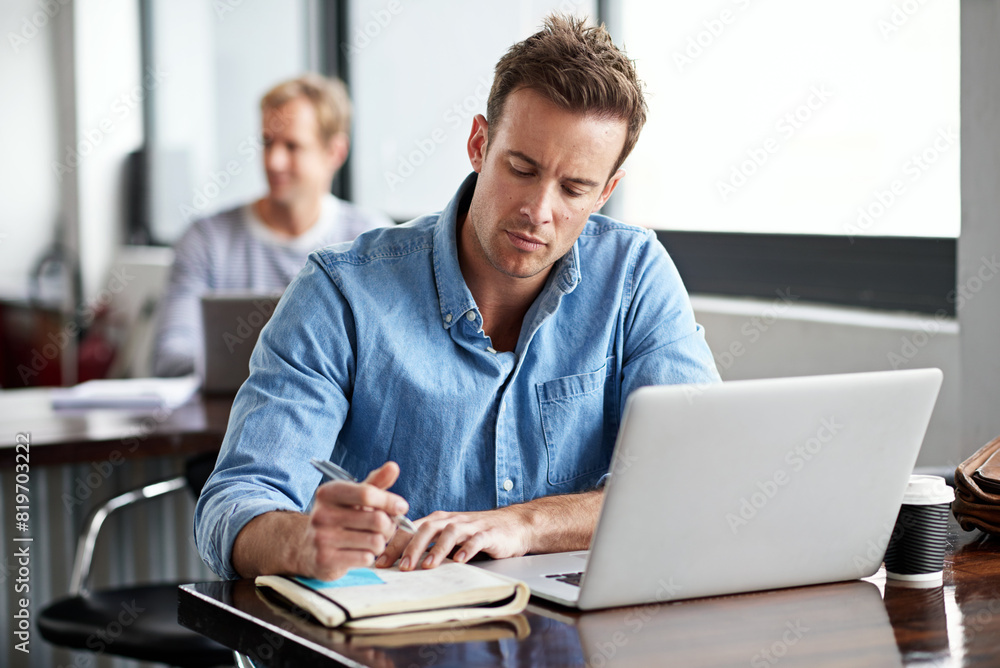 Poster Man, writing on notebook and laptop in office for information with planning design, email and internet research. Male programmer, coding language and studying on computer for software development job