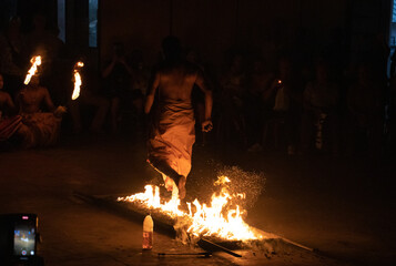 bearfoot man walking across the fire , traditional show,Sri Lanka