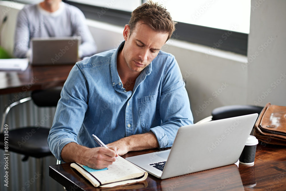 Poster Man, writing on book and laptop in modern office for information with project planning, email and internet research. Male programmer, coding language and learning on computer for software development