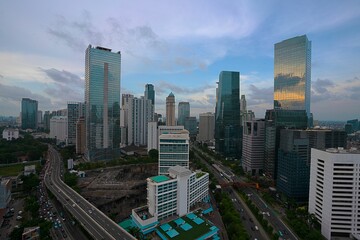 Naklejka premium Nighttime aerial view of the cityscape of Jakarta, Indonesia.