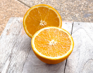 Abstract photo of half of fresh orange fruit that has juicy pulp. Sliced cut of navel orange fruit.