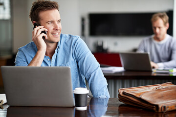 Laptop, phone call and conversation in office for businessman, talking and cellphone in workplace....