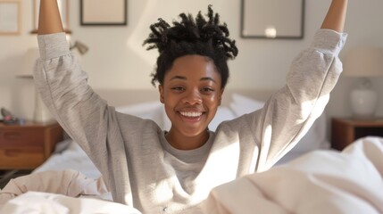 Woman Stretching in Bed at Morning