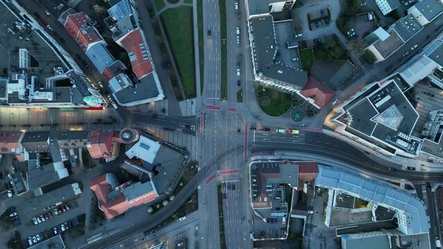 Aerial view of Cottbus revealing a crossroad with vehicles surrounded by urban residential buildings