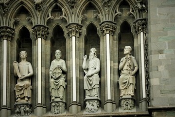 Statues adorning the wall of Nidaros Cathedral. Trondheim, Norway.