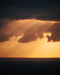 A beautiful shot of a glowing bright sunset sky over a sea