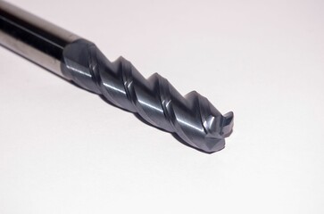 Close-up image of a metalworking instrument, featuring a mill endmill drill tap reamer