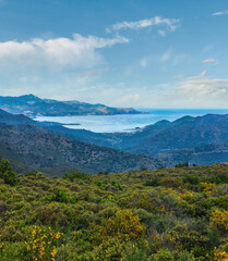 Panoramic summer view of Cadaques bay (Costa Brava) from mountain pass, Girona, Catalonia, Spain.