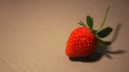 one strawberries on a table, aesthetic